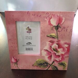 - Pink Floral Picture Frame. Picture size: 3.5” x5”.
Like new
